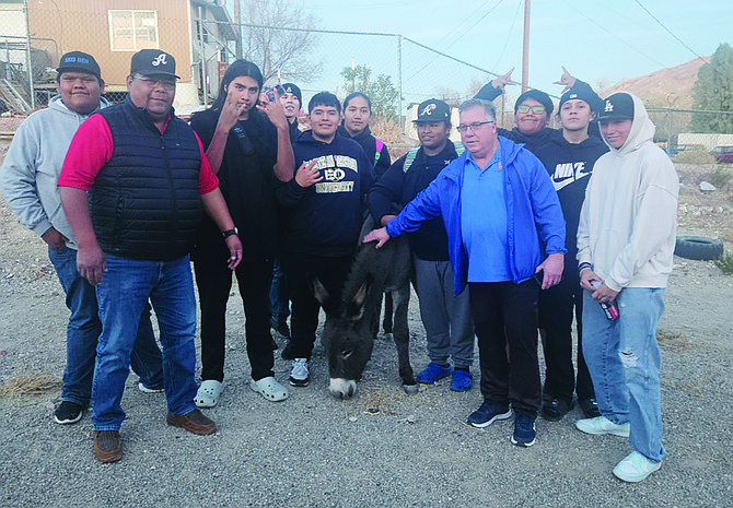 The McDermitt High School boys basketball team  takes some time to have a little fun in between games at the Beatty Bash in Beatty this past weekend.