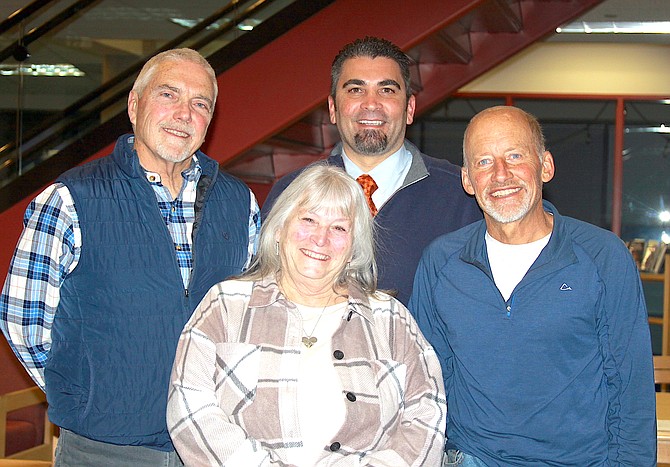 Trustee Carey Kangas, Superintendent Frankie Alvarado, Doug Englekirk, and Linda Gilkerson at the Dec. 10 school board meeting.