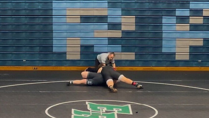 Eatonville's Aaron Tozier dominates his opponent in one of his earlier matches at the Rogers Holiday Tournament. He would go on to win this match but fall short in the championship match.