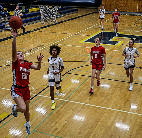 Snohomish Panther sophomore Danica Avalos scores on a sprintaway shot during second quarter play of the game between Everett and Snohomish Friday, Dec. 20 in Everett. The Snohomish girls team capped off a fine double header, Boys and Girls, with a 57 - 24 win over the Everett Seagulls. The Panthers held the Seagull scoreless until the final seconds of the first period when Everett dropped in 2 free throws to get on the board. Snohomish junior guard Kendall Hammer scored three 3-pointers. Akira Shaw shot 18 points for Everett.