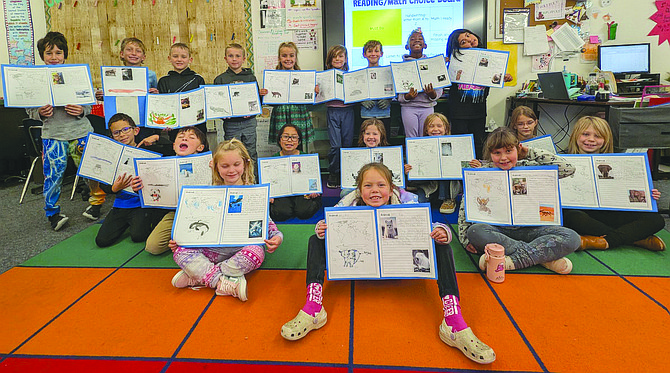 Melissa Humphrey’s class at ECB displays its final animal projects.