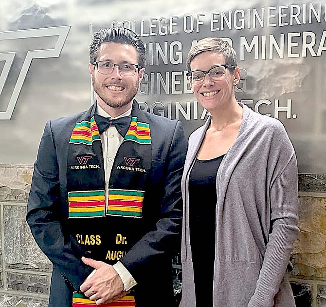 New Dr. August Greth and his advisor Dr. Emily Sarver during Greth’s awardment of a Doctorate of Mining from Virginia Tech.