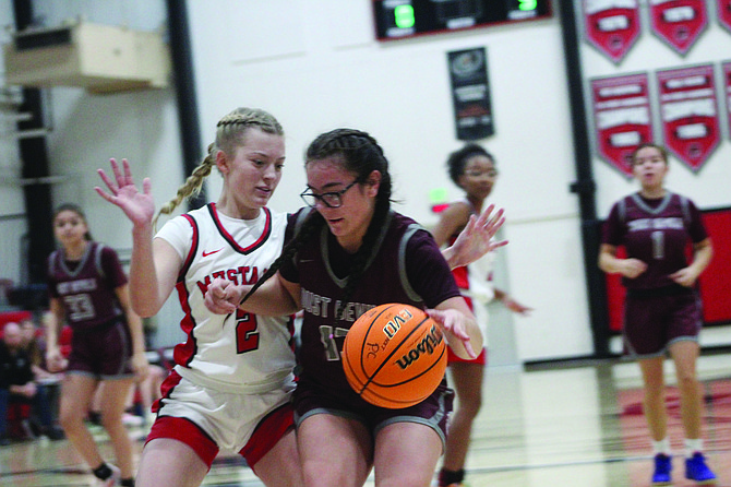 Pershing sophomore Khloe Montes (2) defends against the Dayton Dust Devils last Friday at PCHS