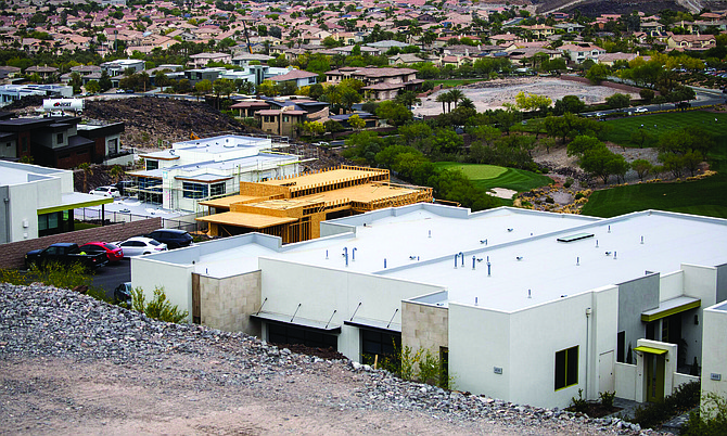 Homes line the hillside at MacDonald Highlands in Henderson on Tuesday, April 26, 2022.