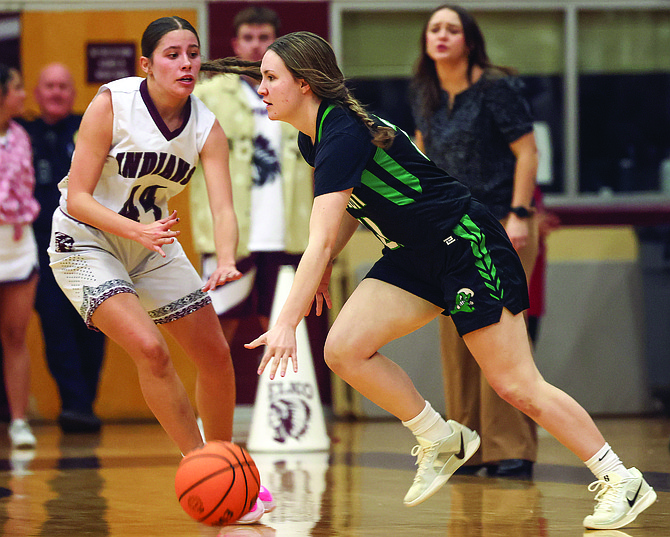 Fallon junior Lea Williams dribbles around the Elko defense Friday.