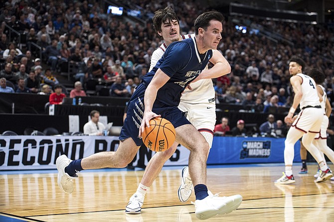 Whether it’s Nick Davidson, pictured last season, or someone else, Nevada is in desperate need of a take-charge guy in the game’s final few minutes, columnist Joe Santoro says.