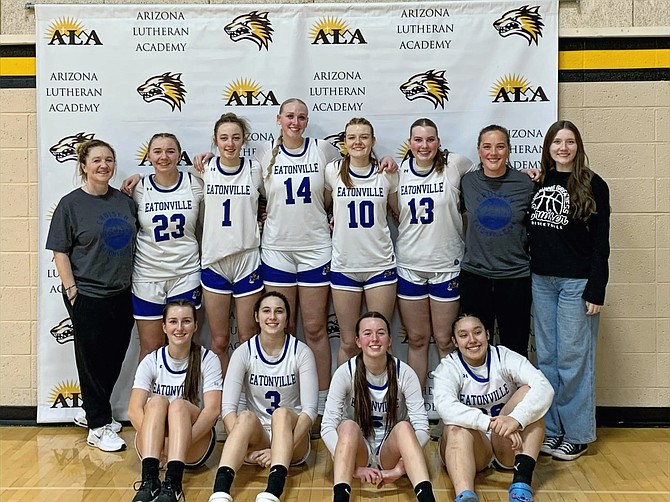 The Eatonville Cruiser girls basketball team poses proudly after securing a third-place finish at the Coyote Basketball Invitational in Phoenix, AZ for the second year in a row.