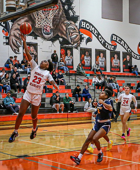 Monroe Bearcat senior Halle Keller drives for a break-away jam in First Period play of the matchup between Everett and Monroe Friday, Jan. 3. 
The Bearcat Varsity Girls outscored visiting Everett 39 - 17.  The score was not even close to the play on the floor. The Seagulls worked on defense but was outflanked and outmaneuvered in the second period and had only 4 nets in the first half.  Seagull junior Akilah Shaw delivered a game-high 8 for Everett.
Monroe Bearcat 6-foot-5 senior Aliyah Taylor got 12 nets. Taylor also scooped in eight rebounds and slammed four blocked shots in the match.