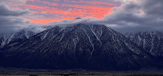 Red sunset at night, photographer's delight in this photo of Jobs Peak in the sunset on Tuesday by Valley resident Michael Smith. The weather for the next week is forecast to be clear.