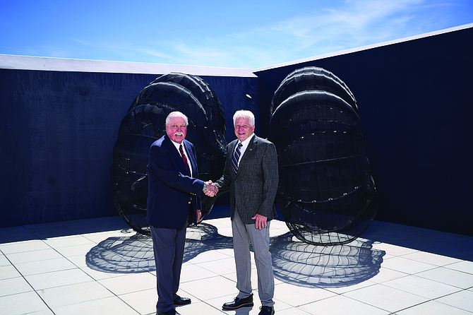 Retiring Director Terrance J. Reeson (left) with Plumas Bancorp and Plumas Bank Chairman of the Board, Daniel E. West (right).