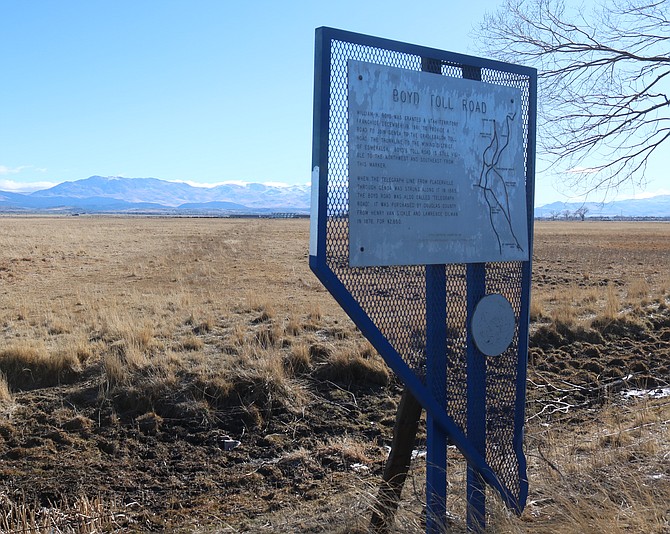 You can reportedly see the faint straight line of the old Boyd Toll Road stretching off southeast of this sign. It was purchased by the county for $2,600 Sept. 18, 1876 from the Van Sickles.