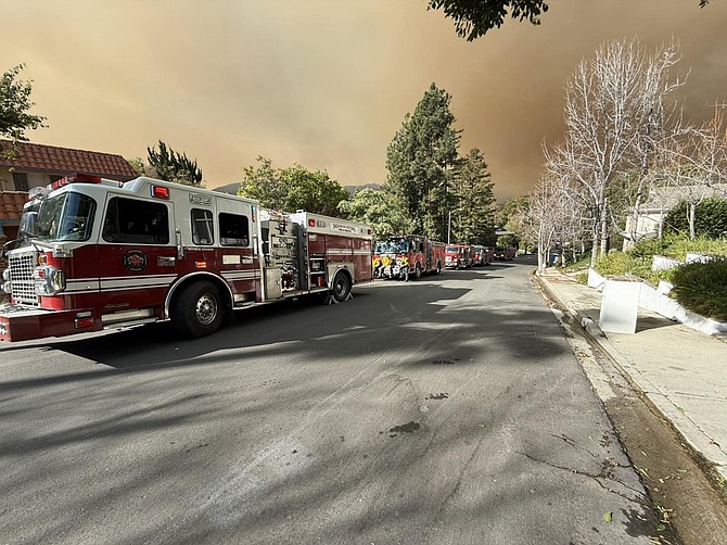 Fire engines from multiple Snohomish County agencies in Los Angeles in an area at risk to the Palisades Fire.