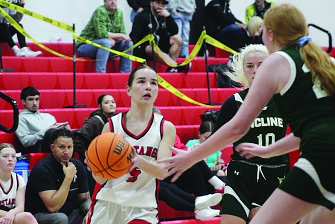 Pershing County's Hayley Montes gets past Incline to shoot for the Mustangs.