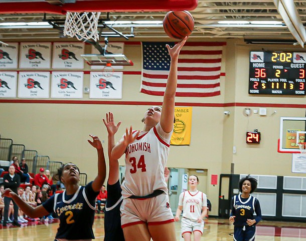 Monroe Bearcat junior Chayce Waite-Kellar grabs Snohomish Panther sophomore Dayton Wheat’s shot away from the net in first period play of the two teams’ matchup Tuesday, Jan. 14 in Snohomish. The Bearcats played their template game with long passes to move their players into shooting range, playing defense along the way to a fine 51-37 win over Snohomish.
Bearcat Junior Wyatt Prohn’s 14 points  and teammate  Caleb Campbell’s 12 powered Monroe’s evening. The Panthers were led by Bryson Wheat’s 17 points and Deyton Wheat’s 11 points.
In Wesco 3A, the Bearcats lead the conference at 5-0 (13-2 overall), with Snohomish standing 2-3 (5-10 overall) as of Sunday, Jan. 19.