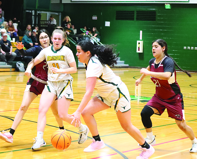 Battle Mountain's Kamila Farias drives to the basket in Thursday's game against West Wendover.