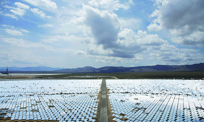 An array of mirrors at the Ivanpah Solar Electric Generating site is shown near Primm on Aug. 13, 2014. (John Locher/The Associated Press)