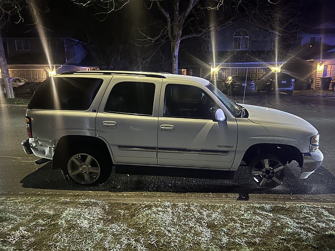 The damaged GMC Yukon driven by the suspect.