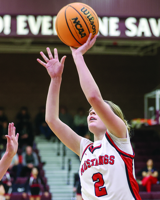 Pershing County's Khloe Montes goes up for a shot against Lincoln County,