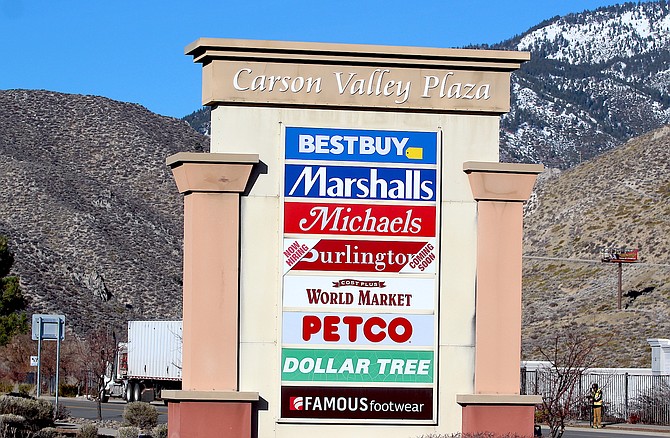 Burlington Coat Factory's sign indicates it's coming soon to Carson Valley Plaza and that they're hiring.