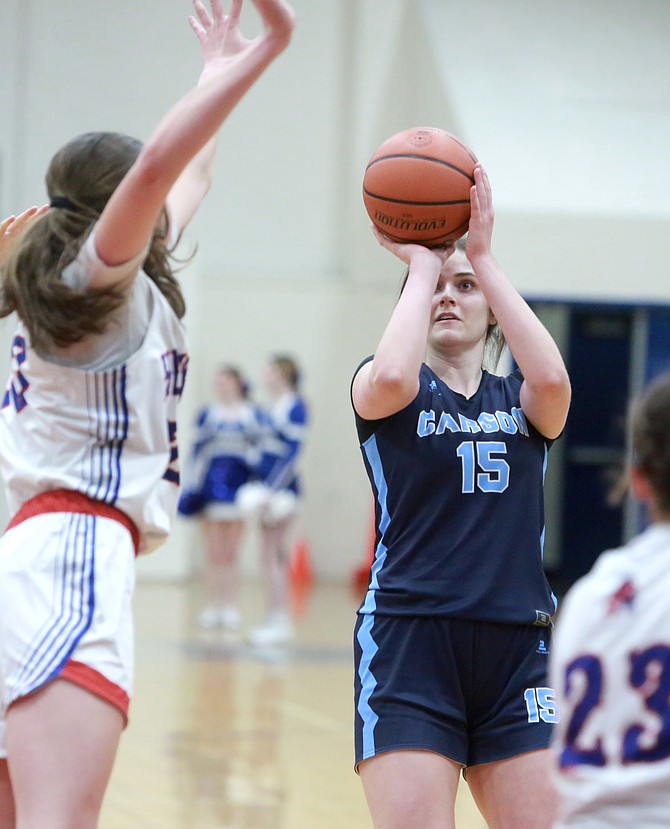 Carson High’s Lauren Finnerty puts up a jumper during the regional tournament against Reno. Finnerty, a senior, was selected to the Class 4A North All-Region first team for the second season in a row.