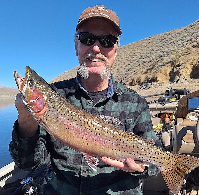 Doug Busey holds a big cutthroat he caught at Topaz Lake over the weekend.