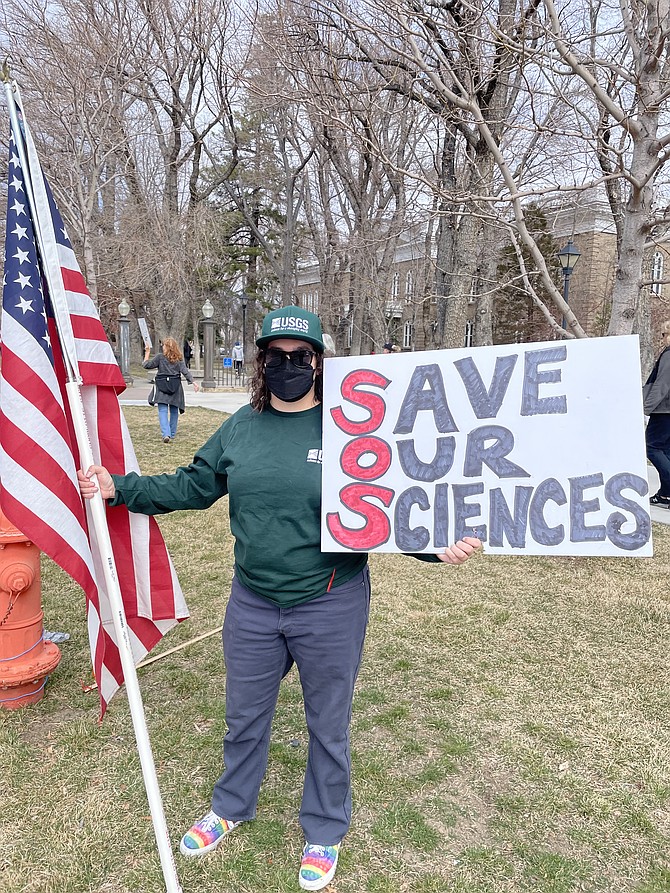 Justine Overacker, fired USGS employee, among anti-Trump protesters on March 4.
