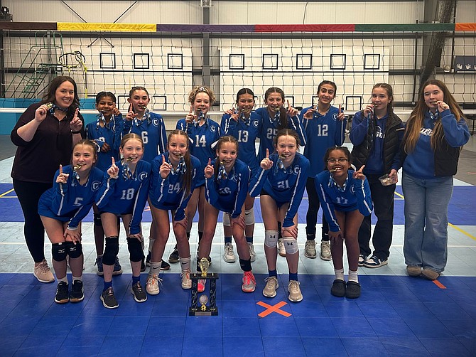 The seventh-grade team from Carson Middle School poses for a photo after taking first place at the Tah-Nevada tournament. The team went 10-1.