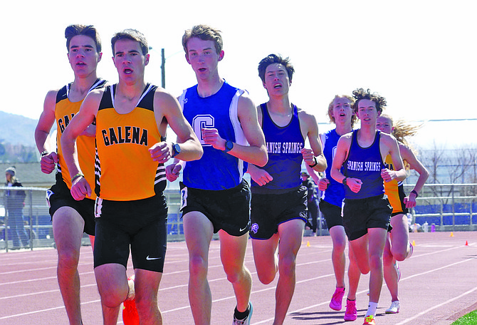 Carson High’s Sean Thornton battles up front in the boys 3,200-meter race Saturday at Carson High. Thornton took fourth in the event while fellow Senator Quinn Kuchnicki (behind) finished in fifth.