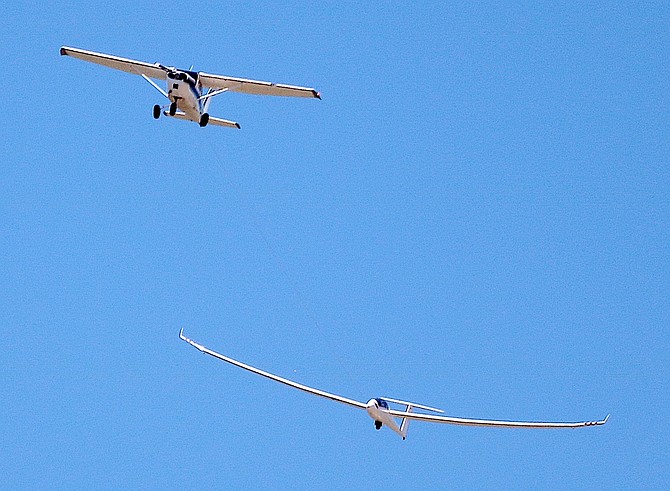 A glider is towed into the air to compete in the 2024 USA Open Class Nationals in May at Minden-Tahoe Airport.