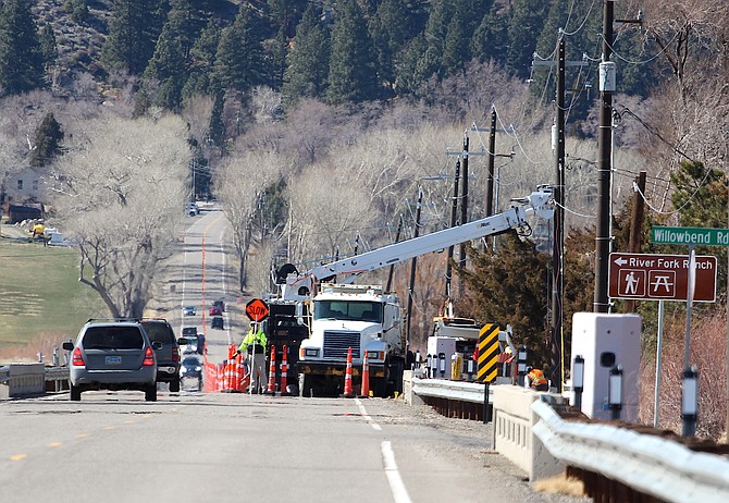 NV Energy was working on the lines along Genoa Lane near the River Fork Ranch on Tuesday afternoon. The road was down to one lane.