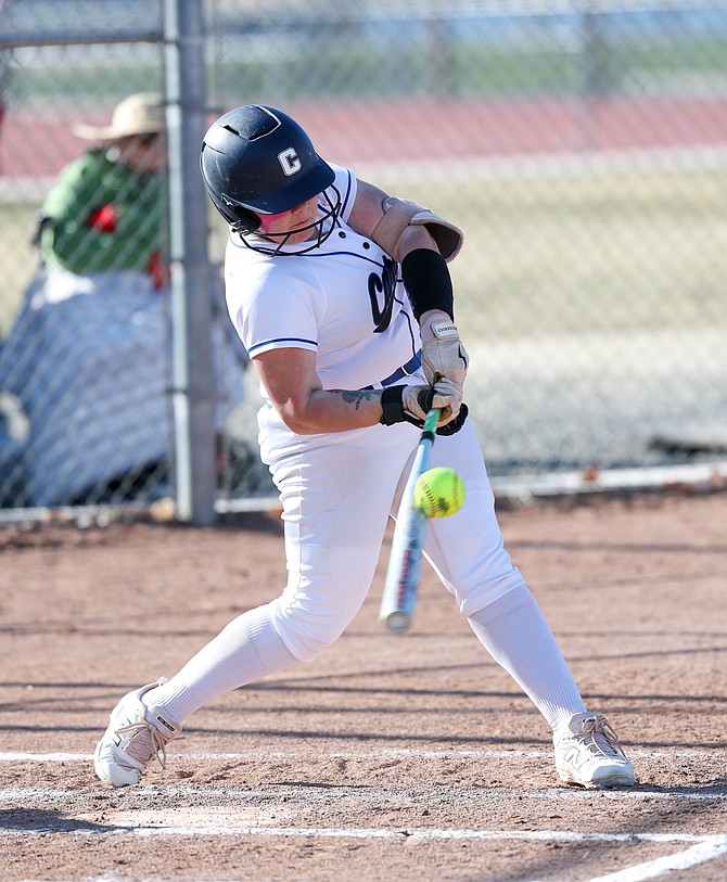 Carson High’s Sofia Morrison turns on a pitch against Damonte Ranch earlier this season. Morrison had four hits Saturday as the Senators swept a doubleheader against Reno.