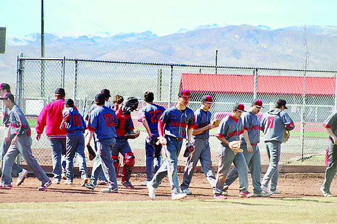 The Pershing County Mustangs head onto the field earlier in the season.