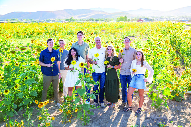 Cameron and Natalie Andelin with their children on their 150-acre farm off Pyramid Highway.