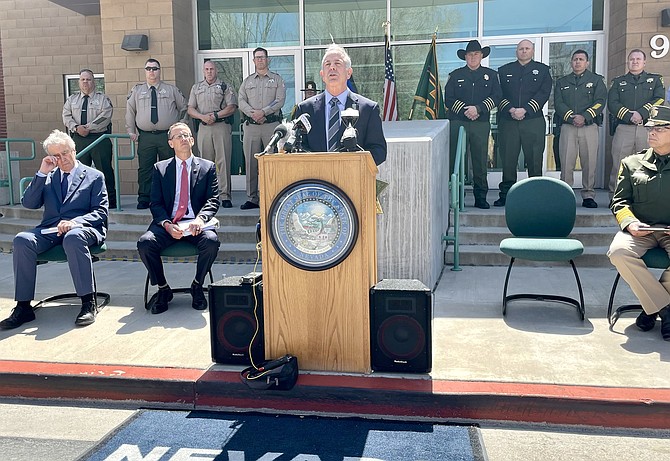 Nevada Gov. Joe Lombardo is shown with law enforcement officials while speaking about his public safety bill outside the Carson City Sheriff’s Office on April 8.
