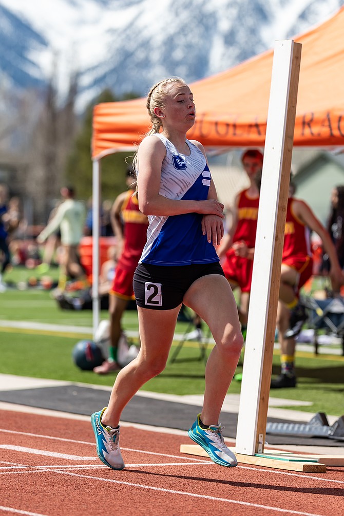 Carson High’s Vea Miner cruises across the line at the Big George Invitational on April 5. Miner won the 800 on Wednesday during the Senators’ home league meet against Reed and Bishop Manogue.