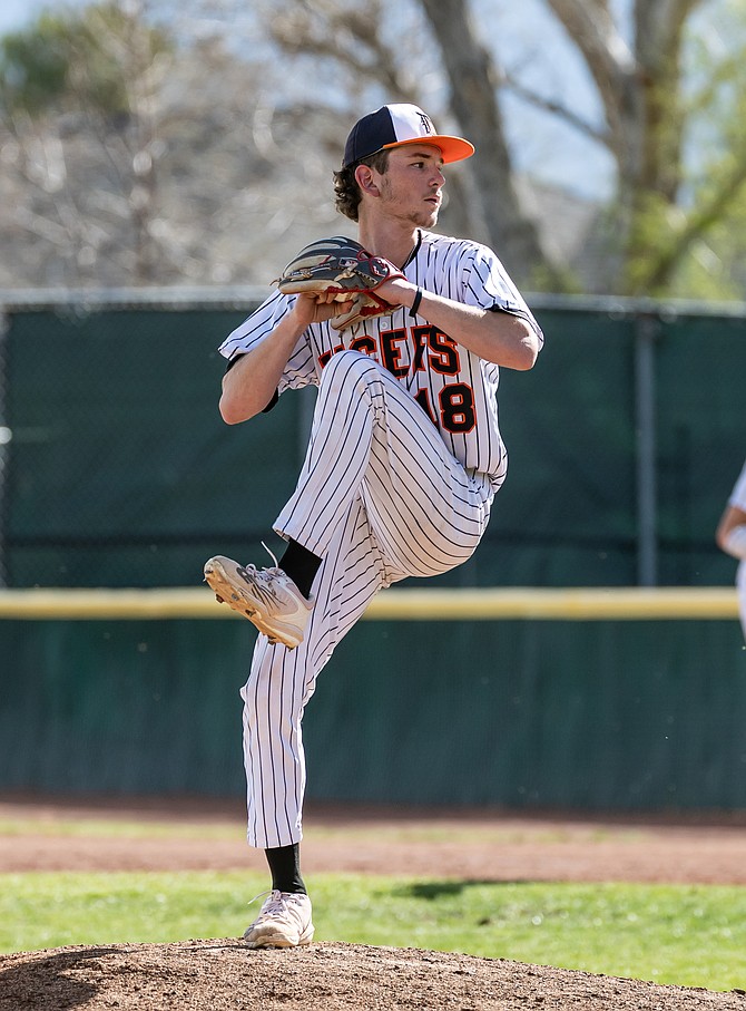 Douglas High junior Grayson Kamper pitches Thursday at home against Reed. Kamper didn’t allow an earned run in six innings in a 9-2 win.