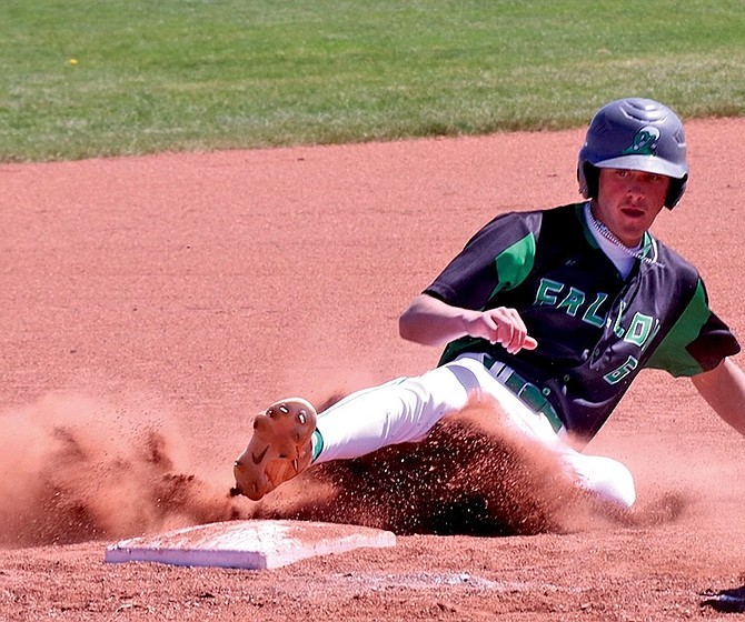 Fallon’s Evan Giovanetti slides into third safely against Lowry.