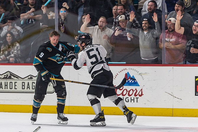 Troy Loggins (No. 9, left) of the Tahoe Knight Monsters tangles with Spencer Blackwell (51) of the Wichita Thunder last week during the regular season finale. The Knight Monsters and Thunder square off in a first round seven-game playoff series, beginning today.