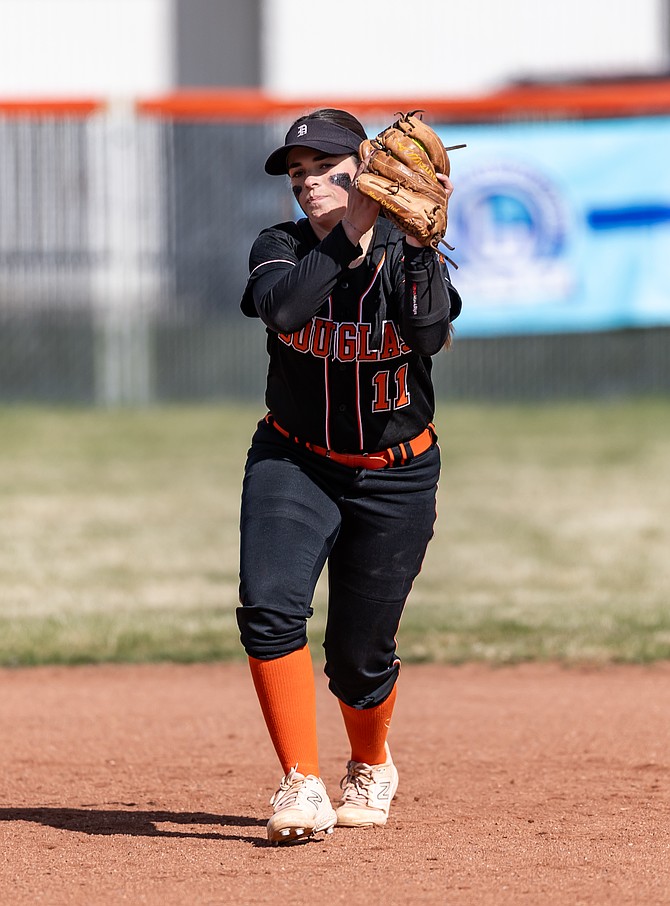 Douglas High’s Ava Gildea makes a play on defense earlier this spring. Gildea had five RBIs in Tuesday’s win over Galena with an RBI double and a grand slam.
