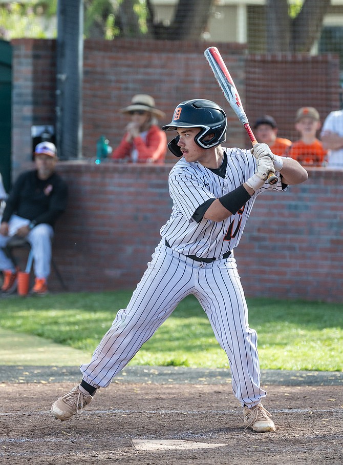 Douglas High School senior Josh Haller takes an at-bat against Carson on Tuesday afternoon in Minden. Haller drew a walk in the Tigers’ 7-1 win over the Senators.