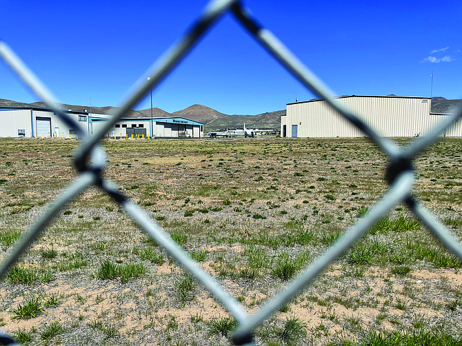 A view of the Carson City Airport and vacant land to be leased near the main parking lot on April 18.