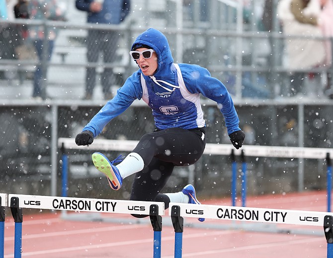 Carson High’s Anne Davis clears a hurdle during the Senators’ home varsity invite last weekend. Davis holds the quickest 100-meter hurdle time in the Class 5A North this season at 16.05.