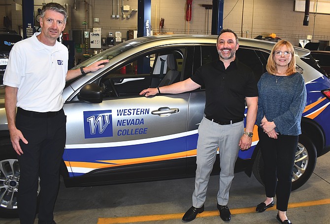 From left, Western Nevada College President J. Kyle Dalpe; Jeff Campagni, general manager of the Dick Campagni Auto Group; and Niki Gladys, WNC chief advancement officer and Foundation executive director. Campagni visited the college’s automotive mechanics shop April 23.