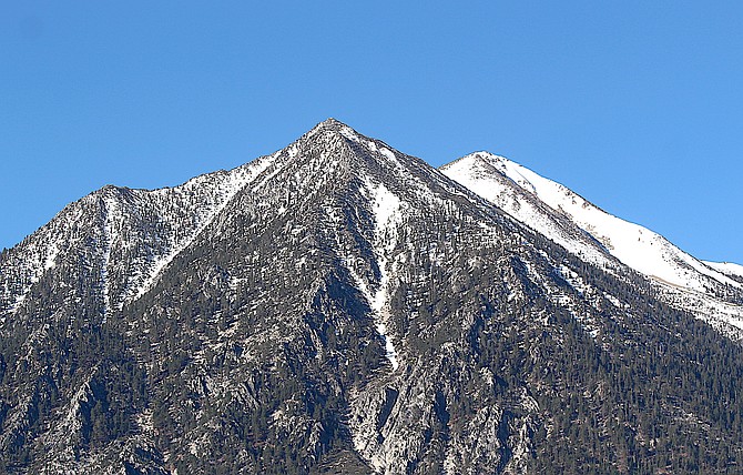 Jobs Peak with a clear blue sky behind it on Thursday morning.