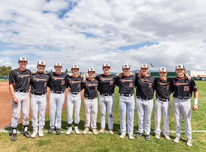 Douglas High School baseball seniors pose for a photo Wednesday. Left to right are Jackson Ovard, Duncan DeLange, Jeffrey Peters, Luke Main, Josh Haller, Colt Cummins, Tyler Sentell, Brent Faiss, Blake Faiss and Jake Hoover.