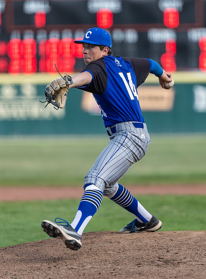 Carson High’s Eli Locatelli delivers against Douglas last week.