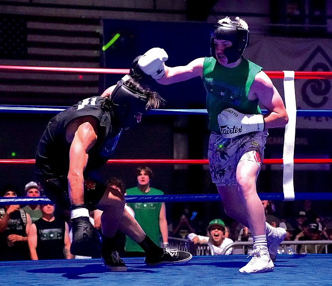 Carson Melendy delivers a final blow to Frankie Cortez to win Friday’s boys main event at the Night of Fights.