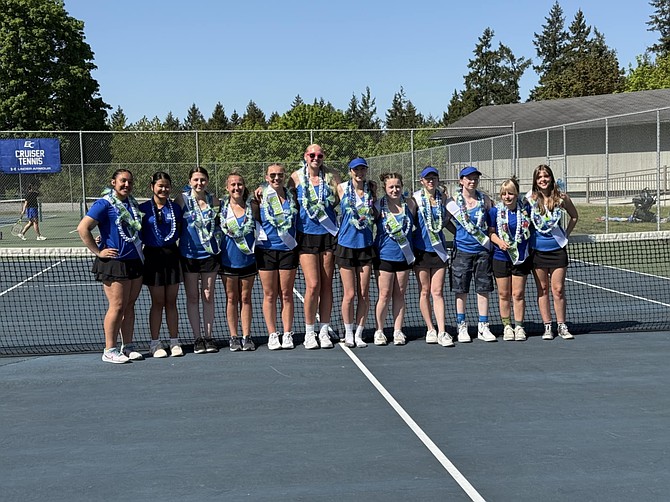 The Eatonville High School girls tennis seniors pose for a photo during Senior Night.