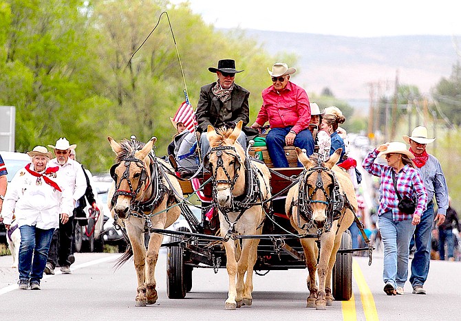 Carson Valley rancher Russell Scossa, in red, celebrated his 80th birthday last weekend as grand marshal of the Invitational Horse Parade on Saturday. He rode on the Silver Saddle Ranch wagon.