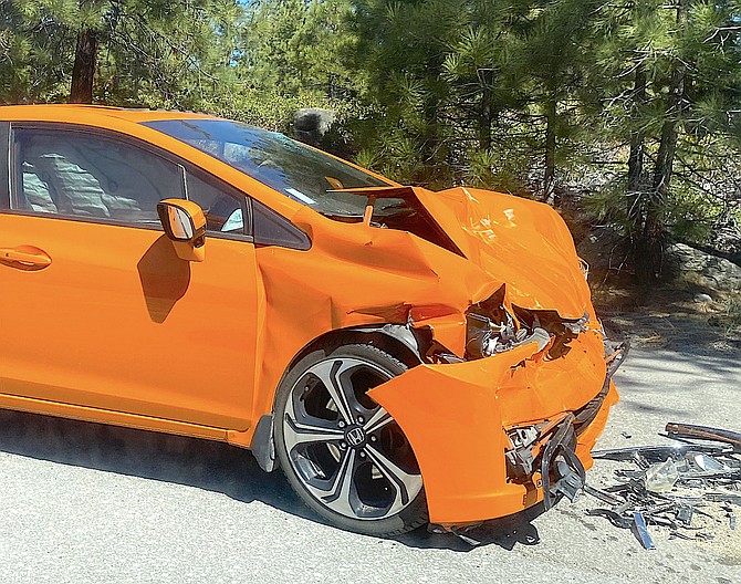 One person was helicoptered to Renown Regional Medical Center by Care Flight from a head-on collision around 10 a.m. Tuesday on Kingsbury Grade at Katherine on the Lake Tahoe side. Photo special to The R-C by Derek Lowes.